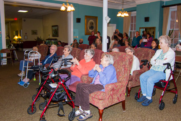 residents watching performance at Vassar Warner Home