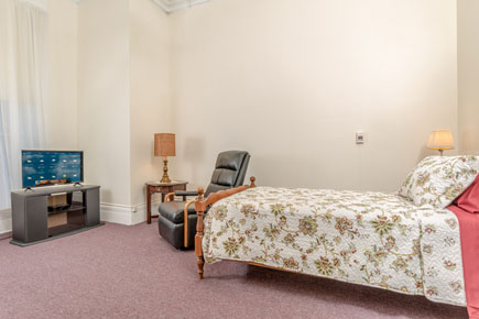 interior of bedroom at Vassar Warner Home